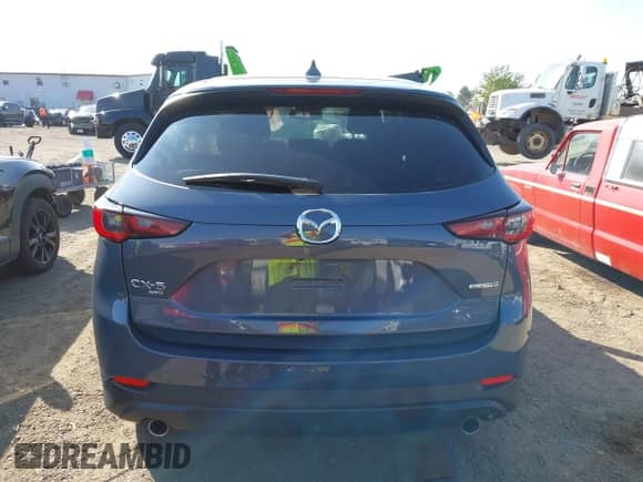 2025 Mazda CX-5 S Carbon Edition z VIN JM3KFBCM9S0588220, wystawiony jako IAAI lot #43244830 z przebiegiem 25 221 mil mil oraz . Historia ofert i sprzedaży dostępna na DreamBid. Obrazek 17.