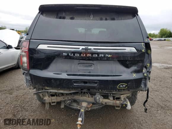 2021 Chevrolet Suburban LT with VIN 1GNSKCKD5MR419345, listed as a Copart auction lot 69445195 with 94,571 mi miles and Salvage title. Bid and sale history available at DreamBid. Image 6.