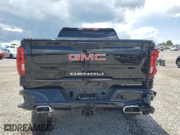 2022 GMC Sierra 1500 Denali with VIN 3GTUUGEL7NG665241, listed as a Copart auction lot 58975895 with 14,571 mi miles and Salvage title. Bid and sale history available at DreamBid. Image 6.