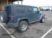 2007 Jeep Wrangler Unlimited Sahara z VIN 1J4GA59107L120503, wystawiony jako IAAI lot #42019384 z przebiegiem 230 965 mil mil oraz . Historia ofert i sprzedaży dostępna na DreamBid. Obrazek 4.