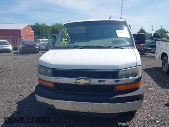 2014 Chevrolet Express Passenger LT with VIN 1GAZG1FG7E1116223, listed as a IAAI auction lot 42600132 with 297,913 mi miles and . Bid and sale history available at DreamBid. Image 6.