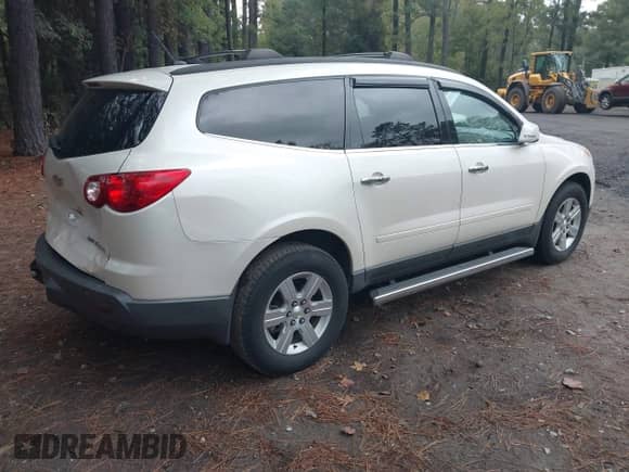 2012 Chevrolet Traverse 2LT with VIN 1GNKRJEDXCJ143415, listed as a IAAI auction lot 43440308 with 139,990 mi miles and . Bid and sale history available at DreamBid. Image 4.