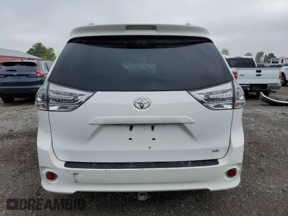 2016 Toyota Sienna SE with VIN 5TDXK3DC6GS760889, listed as a Copart auction lot 82033715 with 208,553 mi miles and Salvage title. Bid and sale history available at DreamBid. Image 6.