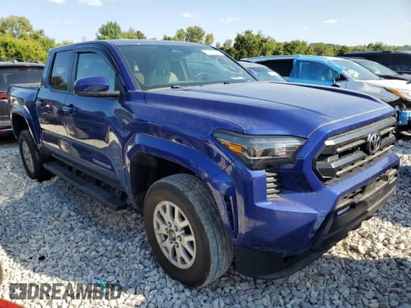 2024 Toyota Tacoma TRD Off Road with VIN 3TMLB5JN0RM031080, listed as a Copart auction lot 70222045 with 3,177 mi miles and Salvage title. Bid and sale history available at DreamBid. Image 4.