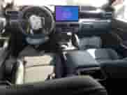 2024 Toyota Tacoma SR5 with VIN 3TMLB5JN4RM050957, listed as a Copart auction lot 71130595 with 1,873 mi miles and Salvage title. Bid and sale history available at DreamBid. Image 8.
