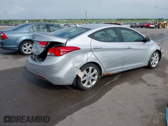 2012 Hyundai Elantra Limited z VIN KMHDH4AE2CU414157, wystawiony jako IAAI lot #42564679 z przebiegiem 113 262 mil mil oraz . Historia ofert i sprzedaży dostępna na DreamBid. Obrazek 4.