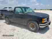 1998 GMC Sierra 1500 z VIN 1GTEC14M8WZ543813, wystawiony jako Copart lot #59757915 z przebiegiem 157 167 mil mil oraz Czysty tytuł • Clean title. Historia ofert i sprzedaży dostępna na DreamBid. Obrazek 4.
