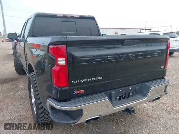 2021 Chevrolet Silverado 1500 LTZ with VIN 3GCUYGEL1MG292569, listed as a IAAI auction lot 42303348 with 43,636 mi miles and . Bid and sale history available at DreamBid. Image 3.
