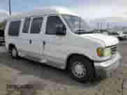 2003 Ford Econoline Cargo Recreational with VIN 1FDRE14L63HA06440, listed as a Copart auction lot 80953915 with 128,565 mi miles and Clean title. Bid and sale history available at DreamBid. Image 4.
