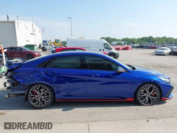 2023 Hyundai Elantra z VIN KMHLW4AKXPU015025, wystawiony jako IAAI lot #42515354 z przebiegiem 21 788 mil mil oraz . Historia ofert i sprzedaży dostępna na DreamBid. Obrazek 14.