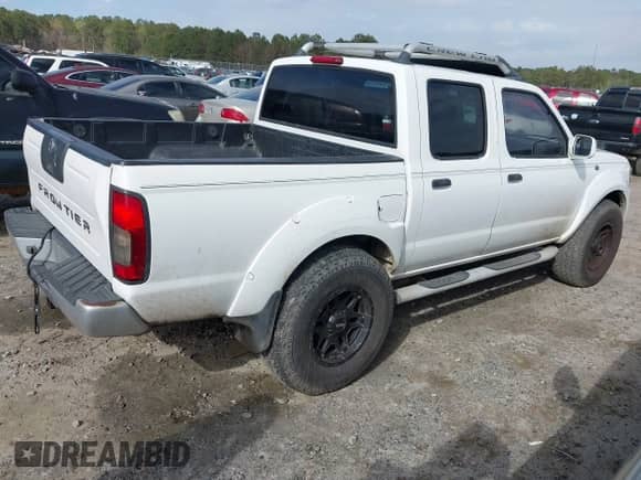 2001 Nissan Frontier XE with VIN 1N6ED27T11C374202, listed as a IAAI auction lot 41847102 with 268,301 mi miles and . Bid and sale history available at DreamBid. Image 4.