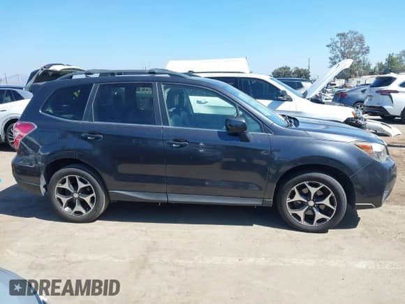 2014 Subaru Forester XT Premium with VIN JF2SJGDC0EH520728, listed as a IAAI auction lot 43336202 with 165,577 mi miles and . Bid and sale history available at DreamBid. Image 13.