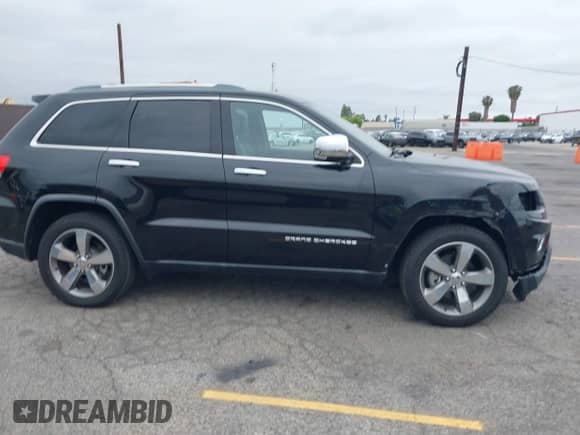 2014 Jeep Grand Cherokee Limited с VIN 1C4RJEBM5EC574519, выставлен на аукционе IAAI как лот 42200304 с пробегом 99 302 миль миль и . История ставок и продаж доступна на DreamBid. Изображение 13.