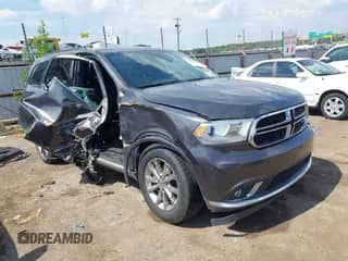 2016 Dodge Durango SXT with VIN 1C4RDJAG5GC393418, listed as a IAAI auction lot 43206789 with 153,703 mi miles and . Bid and sale history available at DreamBid. Image 1.