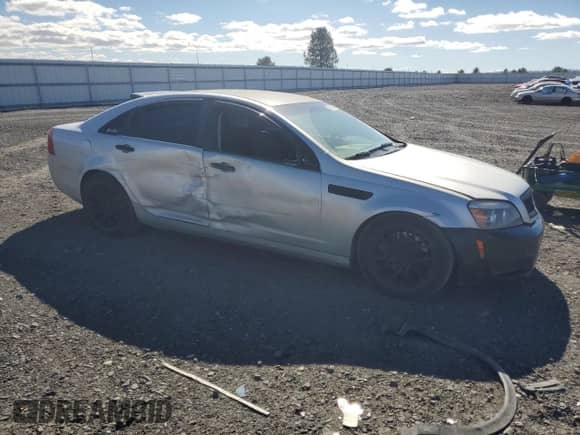 2012 Chevrolet Caprice with VIN 6G1MK5R2XCL633780, listed as a Copart auction lot 73215214 with 151,361 mi miles and Salvage title. Bid and sale history available at DreamBid. Image 4.