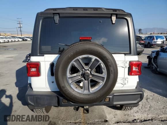 2021 Jeep Wrangler Unlimited Willys with VIN 1C4HJXDN7MW816270, listed as a Copart auction lot 84972215 with 20,982 mi miles and Salvage title. Bid and sale history available at DreamBid. Image 6.