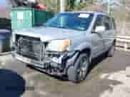 2006 Honda Pilot EX-L with VIN 5FNYF18726B024951, listed as a IAAI auction lot 41639283 with 370,476 mi miles and . Bid and sale history available at DreamBid. Image 2.