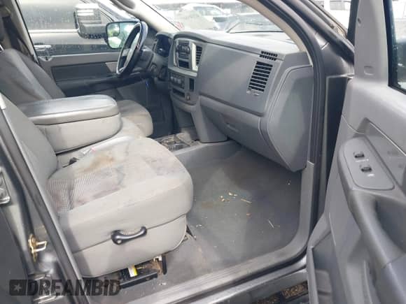 2007 Dodge 1500 SLT z VIN 3D7KR19D57G736423, wystawiony jako IAAI lot #42145607 z przebiegiem 298 274 mil mil oraz . Historia ofert i sprzedaży dostępna na DreamBid. Obrazek 5.