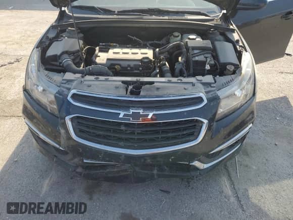 2015 Chevrolet Cruze LT z VIN 1G1PE5SB5F7122244, wystawiony jako Copart lot #69150235 z przebiegiem 105 470 mil mil oraz Szkoda całkowita • Salvage title. Historia ofert i sprzedaży dostępna na DreamBid. Obrazek 11.