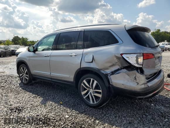 2018 Honda Pilot Touring с VIN 5FNYF5H9XJB000303, выставлен на аукционе Copart как лот 66020165 с пробегом 125 689 миль миль и Списание • Salvage title. История ставок и продаж доступна на DreamBid. Изображение 2.