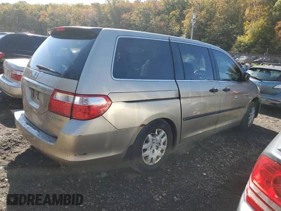 2005 Honda Odyssey LX с VIN 5FNRL38255B031873, выставлен на аукционе Copart как лот 87105105 с пробегом 301 626 миль миль и Списание • Salvage title. История ставок и продаж доступна на DreamBid. Изображение 3.
