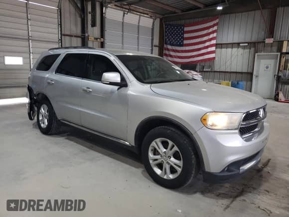 2012 Dodge Durango Crew with VIN 1C4RDJDG8CC118650, listed as a Copart auction lot 66696235 with 195,892 mi miles and Salvage title. Bid and sale history available at DreamBid. Image 4.
