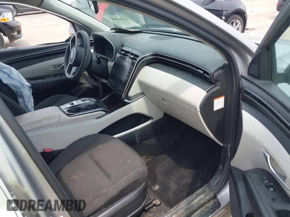 2022 Hyundai Tucson Blue with VIN KM8JBCA1XNU077977, listed as a IAAI auction lot 42868058 with 76,081 mi miles and . Bid and sale history available at DreamBid. Image 5.