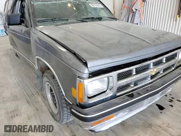 1993 Chevrolet S-10 X96 with VIN 1GCCS14Z5P0163968, listed as a Copart auction lot 56753655 with 128,417 mi miles and Salvage title. Bid and sale history available at DreamBid. Image 13.