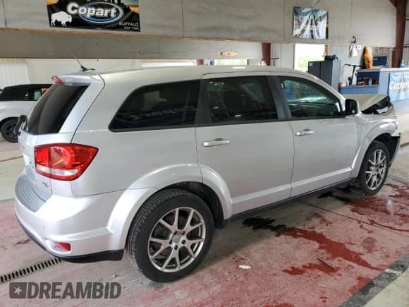 2014 Dodge Journey R/T with VIN 3C4PDCEG7ET112539, listed as a Copart auction lot 63518715 with 90,026 mi miles and Salvage title. Bid and sale history available at DreamBid. Image 3.