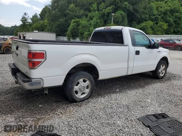 2010 Ford F-150 XL with VIN 1FTNF1CV7AKE77502, listed as a Copart auction lot 63312905 with 283,750 mi miles and Clean title. Bid and sale history available at DreamBid. Image 3.