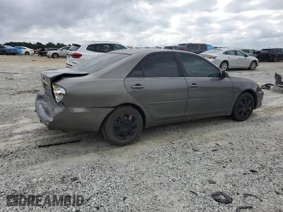2005 Toyota Camry STD с VIN 4T1BE32KX5U540297, выставлен на аукционе Copart как лот 81882295 с пробегом 212 090 миль миль и Списание • Salvage title. История ставок и продаж доступна на DreamBid. Изображение 3.