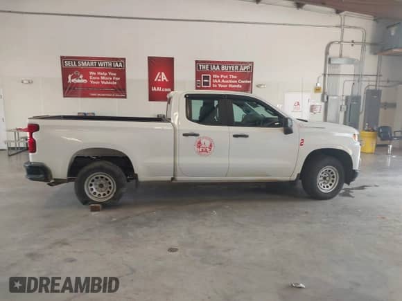 2020 Chevrolet Silverado 1500 Work Truck with VIN 1GCRWAEFXLZ217998, listed as a IAAI auction lot 42981835 with 43,752 mi miles and . Bid and sale history available at DreamBid. Image 14.