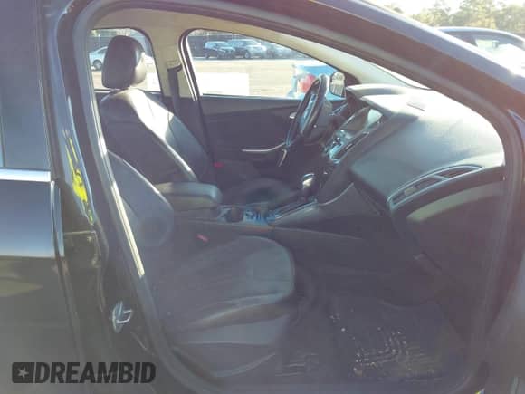 2014 Ford Focus Titanium with VIN 1FADP3J23EL211171, listed as a IAAI auction lot 43471214 with 142,101 mi miles and . Bid and sale history available at DreamBid. Image 5.