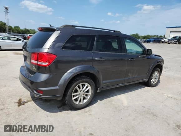 2016 Dodge Journey SXT with VIN 3C4PDCBG7GT145872, listed as a Copart auction lot 64283285 with 163,401 mi miles and Salvage title. Bid and sale history available at DreamBid. Image 3.