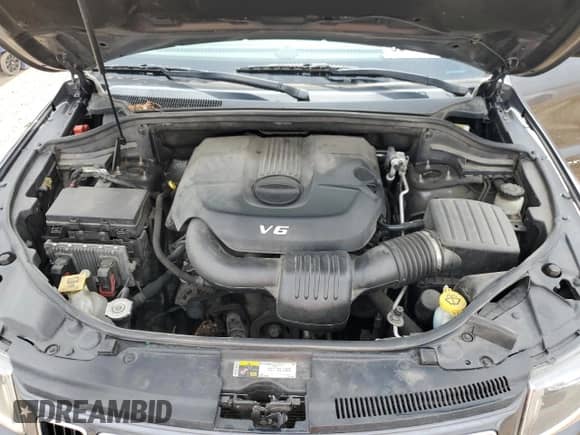 2014 Jeep Grand Cherokee Limited z VIN 1C4RJFBGXEC540625, wystawiony jako Copart lot #63450735 z przebiegiem 127 958 mil mil oraz Szkoda całkowita • Salvage title. Historia ofert i sprzedaży dostępna na DreamBid. Obrazek 11.