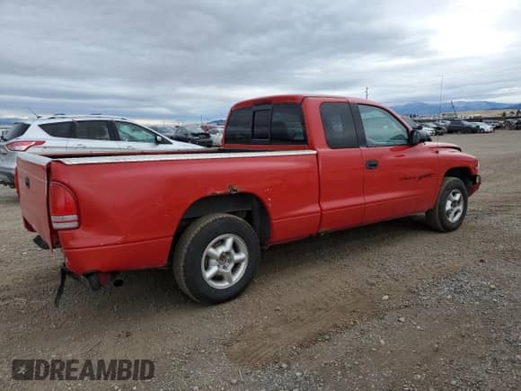 1998 Dodge Dakota SLT z VIN 1B7GL22X4WS573038, wystawiony jako Copart lot #44205935 z przebiegiem 126 293 mil mil oraz Czysty tytuł • Clean title. Historia ofert i sprzedaży dostępna na DreamBid. Obrazek 3.