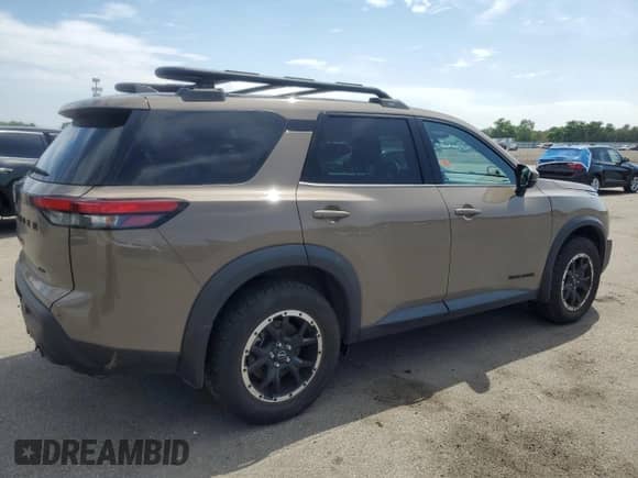 2023 Nissan Pathfinder Rock Creek with VIN 5N1DR3BDXPC263061, listed as a Copart auction lot 61446705 with 22,545 mi miles and Salvage title. Bid and sale history available at DreamBid. Image 3.