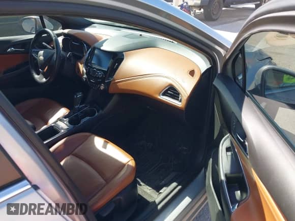 2018 Chevrolet Cruze LT z VIN 1G1BH5SEXJ7100003, wystawiony jako IAAI lot #41677824 z przebiegiem 100 935 mil mil oraz . Historia ofert i sprzedaży dostępna na DreamBid. Obrazek 5.