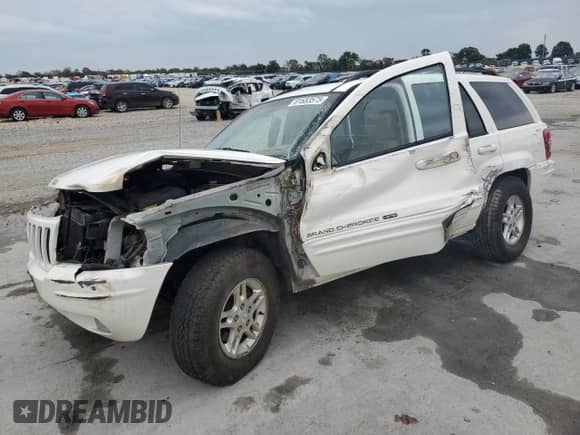 2000 Jeep Grand Cherokee Limited z VIN 1J4GW58N7YC136589, wystawiony jako Copart lot #81653575 z przebiegiem 122 365 mil mil oraz Szkoda całkowita • Salvage title. Historia ofert i sprzedaży dostępna na DreamBid. Obrazek 1.