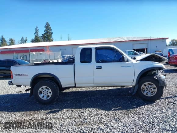 2000 Toyota Tacoma with VIN 5TEWM72N9YZ709411, listed as a IAAI auction lot 43417590 with 249,085 mi miles and . Bid and sale history available at DreamBid. Image 14.