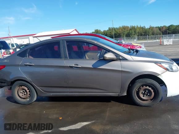 2013 Hyundai Accent GLS with VIN KMHCT4AE8DU390734, listed as a IAAI auction lot 43384475 with 246,173 mi miles and . Bid and sale history available at DreamBid. Image 13.