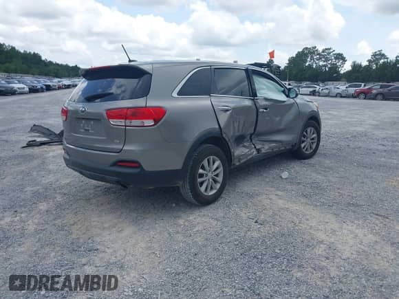 2018 Kia Sorento LX with VIN 5XYPG4A39JG339054, listed as a IAAI auction lot 42476816 with 121,340 mi miles and . Bid and sale history available at DreamBid. Image 4.