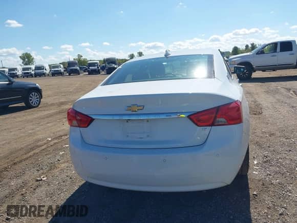 2016 Chevrolet Impala LT with VIN 2G1105SAXG9204577, listed as a IAAI auction lot 43327701 with 113,239 mi miles and . Bid and sale history available at DreamBid. Image 16.