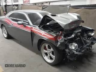 2012 Dodge Challenger R/T with VIN 2C3CDYBT1CH149903, listed as a IAAI auction lot 42031543 with 198,017 mi miles and . Bid and sale history available at DreamBid. Image 1.