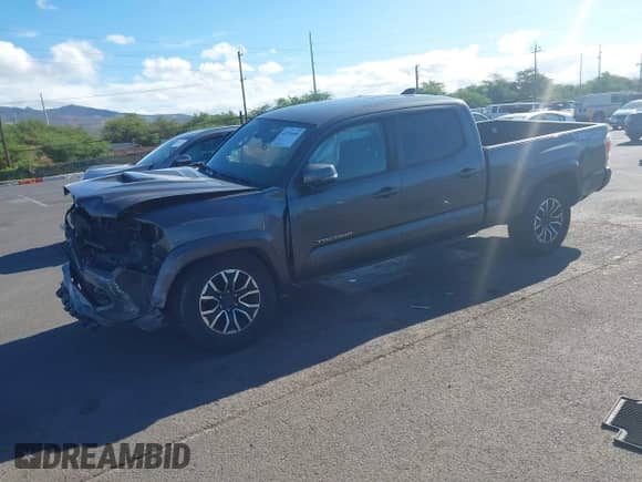 2020 Toyota Tacoma SR5 with VIN 3TMDZ5BNXLM084553, listed as a IAAI auction lot 42556448 with 74,634 mi miles and . Bid and sale history available at DreamBid. Image 18.