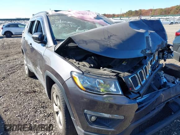 2021 Jeep Compass Latitude with VIN 3C4NJDBB8MT537958, listed as a IAAI auction lot 40705924 with 73,319 mi miles and . Bid and sale history available at DreamBid. Image 18.