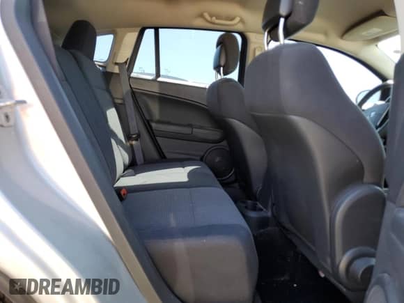 2011 Dodge Caliber Mainstreet z VIN 1B3CB3HAXBD254317, wystawiony jako Copart lot #66276155 z przebiegiem 65 684 mil mil oraz Czysty tytuł • Clean title. Historia ofert i sprzedaży dostępna na DreamBid. Obrazek 10.