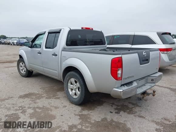 2012 Nissan Frontier SV with VIN 1N6AD0ER1CC450076, listed as a IAAI auction lot 43107301 with 180,465 mi miles and . Bid and sale history available at DreamBid. Image 3.
