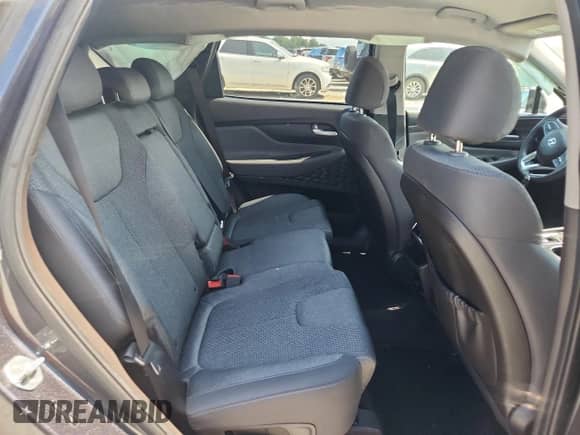 2020 Hyundai Santa Fe SEL z VIN 5NMS33AD1LH240164, wystawiony jako Copart lot #81011425 z przebiegiem 75 038 mil mil oraz Szkoda całkowita • Salvage title. Historia ofert i sprzedaży dostępna na DreamBid. Obrazek 11.