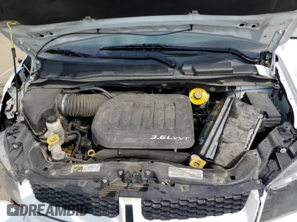 2018 Dodge Grand Caravan GT with VIN 2C4RDGEG3JR202204, listed as a Copart auction lot 67052565 with 126,860 mi miles and Salvage title. Bid and sale history available at DreamBid. Image 12.